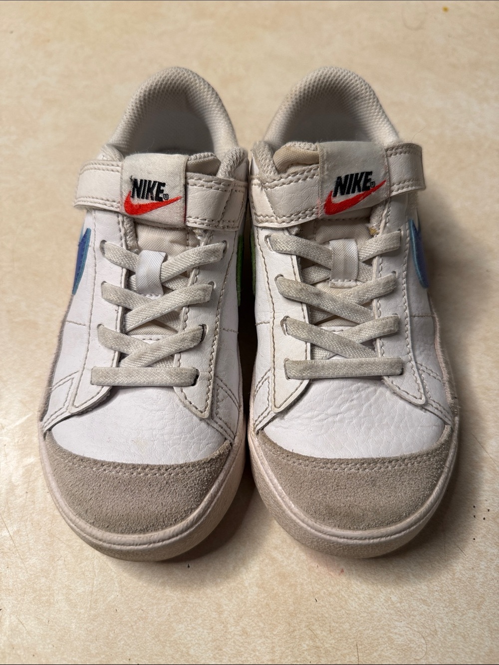 Nike Kids White Sneakers with Blue Swoosh outside Green inside
